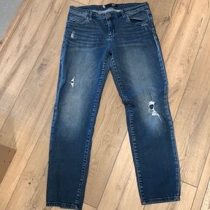 Cropped, distressed boyfriend style jean